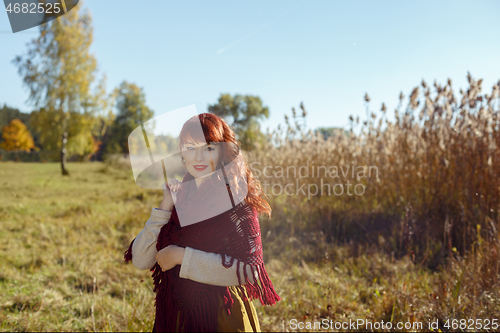 Image of Beautiful girl outdoors in countryside