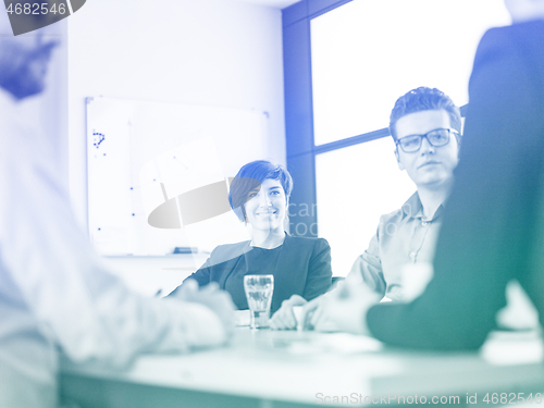 Image of Business Team At A Meeting at modern office building