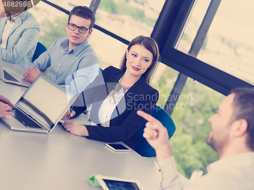 Image of Business Team At A Meeting at modern office building