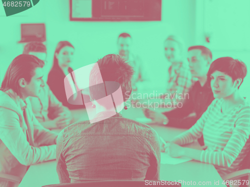 Image of Business Team At A Meeting at modern office building