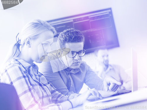 Image of Business Team At A Meeting at modern office building