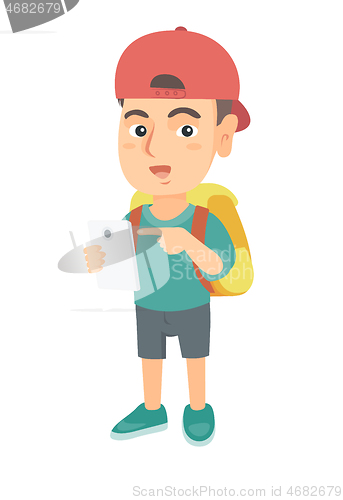 Image of Caucasian boy with backpack pointing at cellphone.