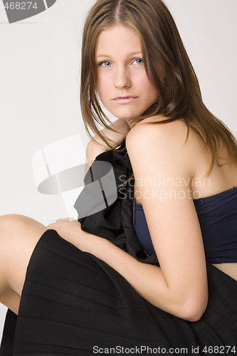 Image of young beautiful sad woman