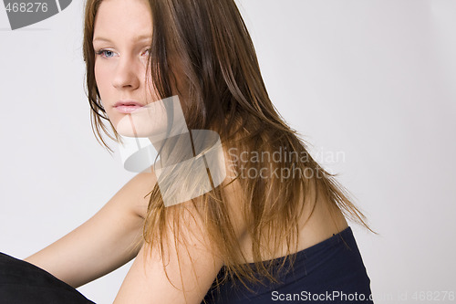 Image of young beautiful sad woman