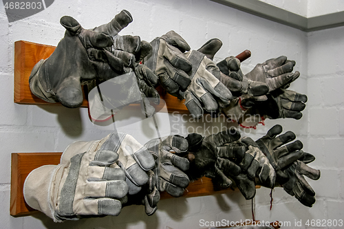 Image of Working gloves at the wall.