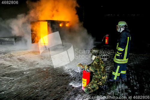 Image of Firefighters training for fire fighting.