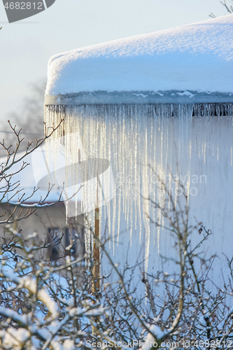 Image of Roof with icicles hanging from roof.