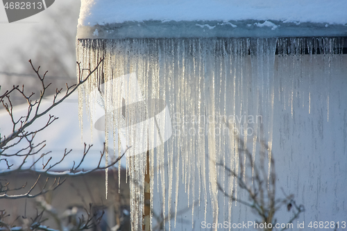 Image of Roof with icicles hanging from roof.