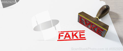 Image of red fake stamp on white paper background