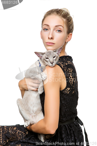 Image of Beautiful girl with oriental siam cat