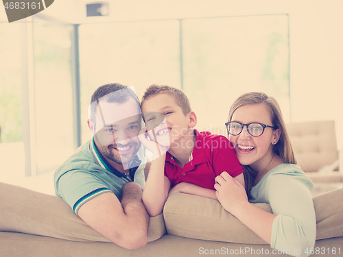 Image of family with little boy enjoys in the modern living room