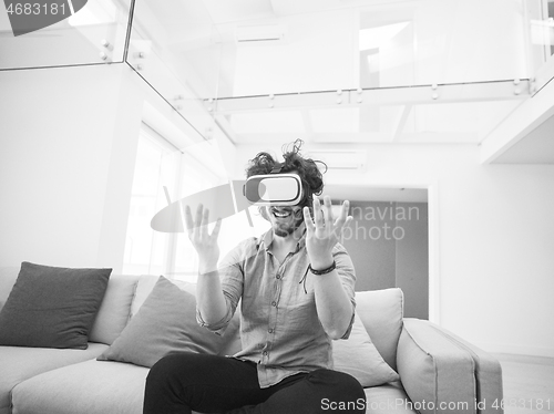 Image of man using VR-headset glasses of virtual reality