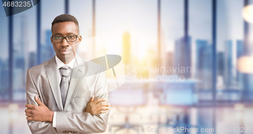 Image of Young businessman in his office