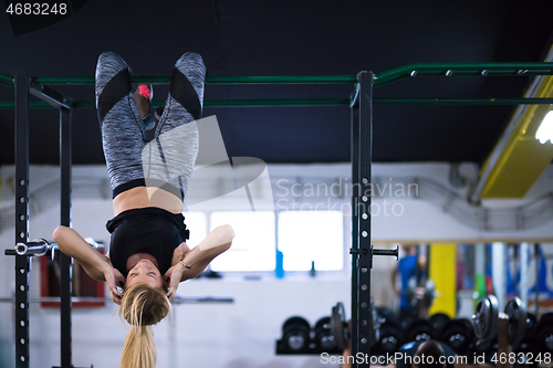 Image of woman doing abs exercises