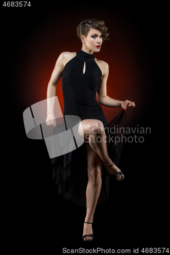 Image of girl dancer in tango dress