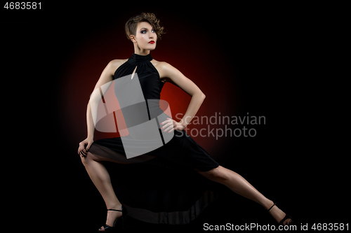 Image of girl dancer in tango dress