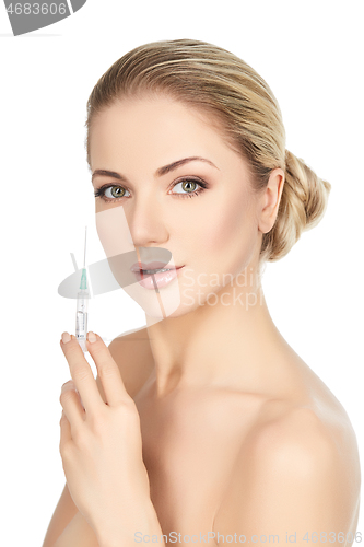Image of beautiful girl holding syringe isolated on white