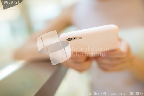 Image of Woman hand hold with cellphone