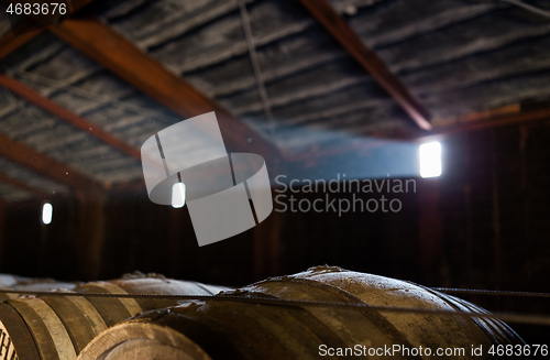 Image of Wooden barrels at beer factory