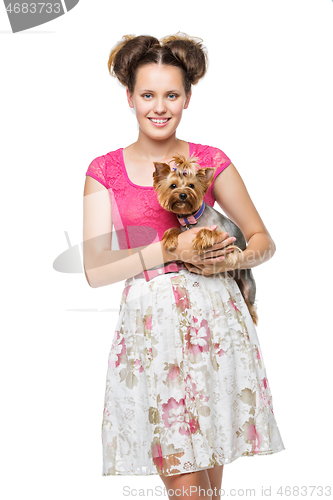 Image of Girl with yorkie dog