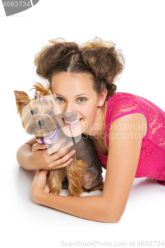 Image of Girl with yorkie dog