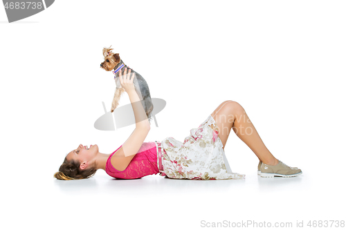 Image of Girl with yorkie dog