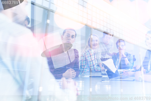 Image of Business Team At A Meeting at modern office building