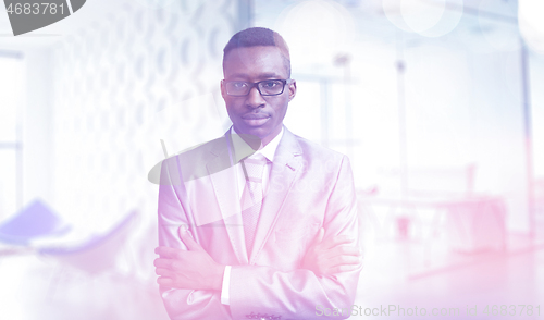 Image of Young businessman in his office