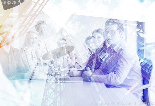 Image of Business Team At A Meeting at modern office building