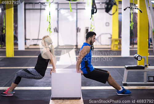 Image of athletes working out their arms