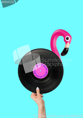 Image of Let\'s take a music break. Flamingo with vinyl record as a body and hand as legs. Modern design. Contemporary art collage.