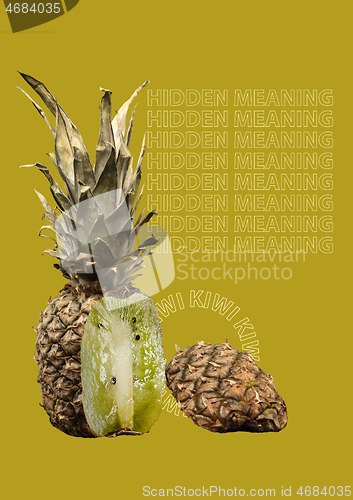 Image of A paradox. Unusual fruit - pineapple outside anq kiwi inside. Unexpected mix. Hidden meaning concept. Modern design. Contemporary art collage.
