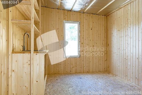 Image of Interior of a new wooden kitchen in a country house