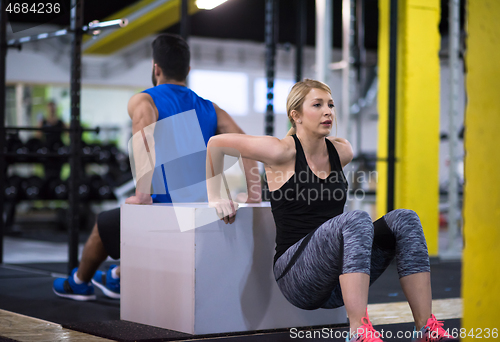 Image of athletes working out their arms