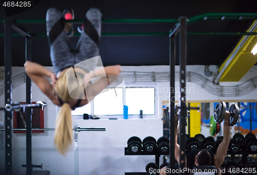 Image of woman doing abs exercises