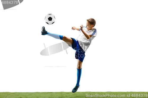 Image of Young boy with soccer ball isolated on white. football player