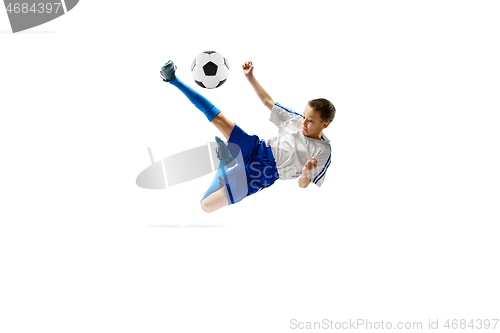 Image of Young boy with soccer ball isolated on white. football player