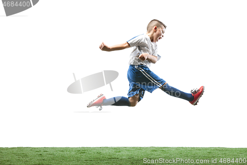 Image of Young boy with soccer ball isolated on white. football player