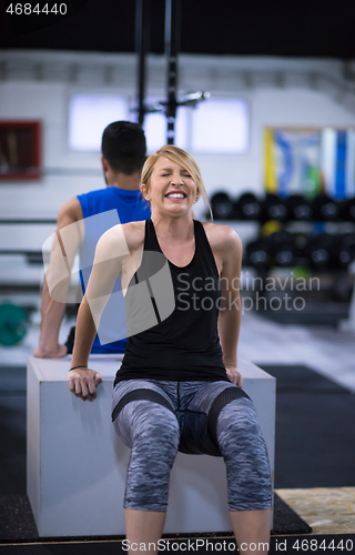 Image of athletes working out their arms