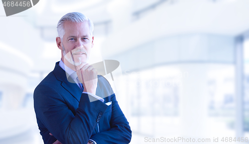 Image of Senior businessman in his office