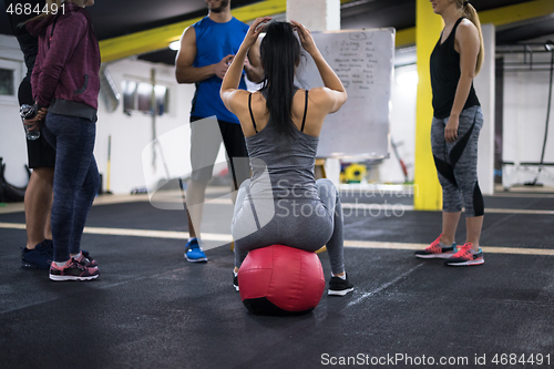 Image of athletes getting instructions from trainer