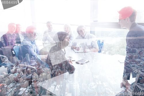 Image of Group of young people meeting in startup office