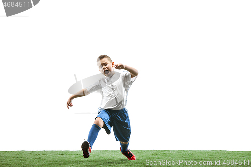 Image of Young boy with soccer ball isolated on white. football player