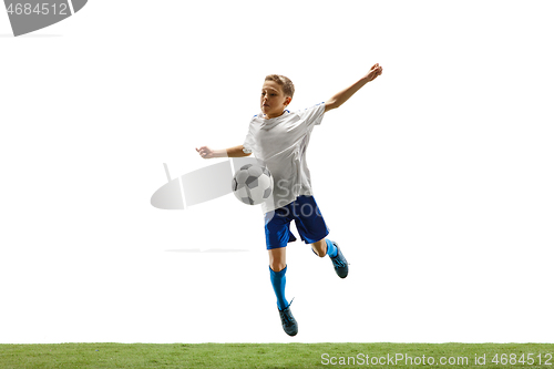 Image of Young boy with soccer ball isolated on white. football player