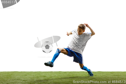 Image of Young boy with soccer ball isolated on white. football player