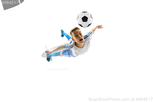 Image of Young boy with soccer ball isolated on white. football player