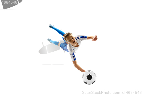 Image of Young boy with soccer ball isolated on white. football player