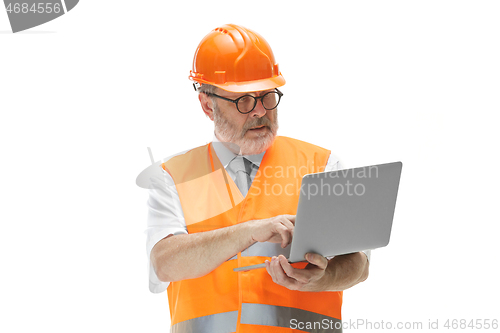 Image of The builder in orange helmet isolated on white