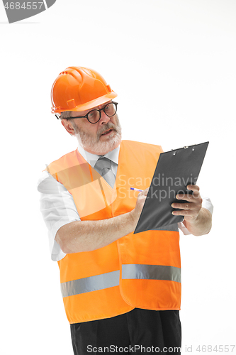 Image of The builder in orange helmet isolated on white