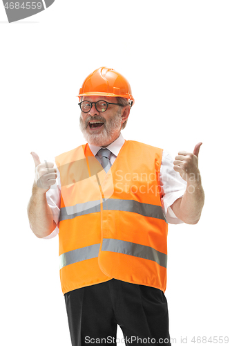 Image of The builder in orange helmet isolated on white